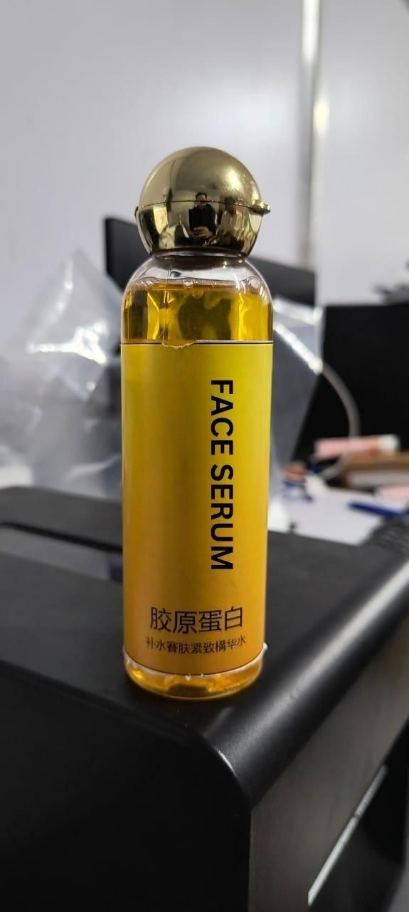 Fupei2-E5 Collagen Anti-Wrinkle Serum in a gold-topped bottle for youthful skin