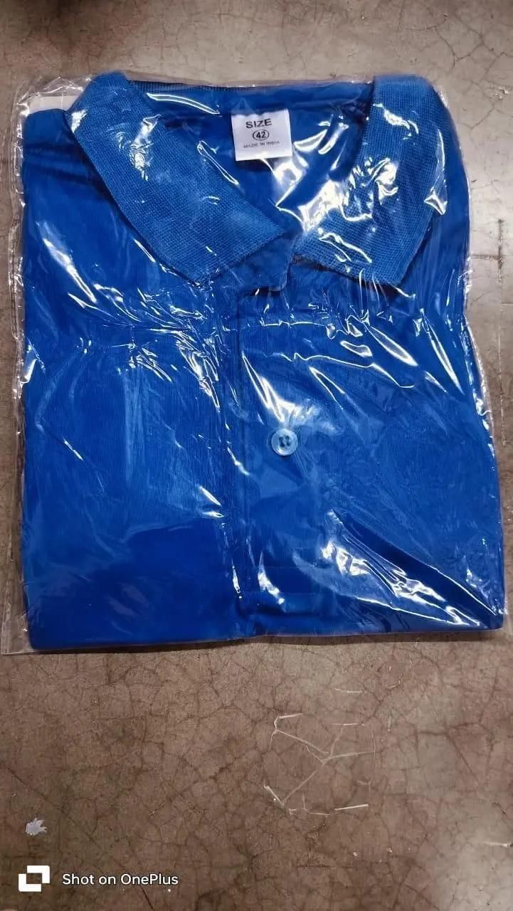 Blue men's polo t-shirt pack folded and wrapped in clear plastic packaging for protection