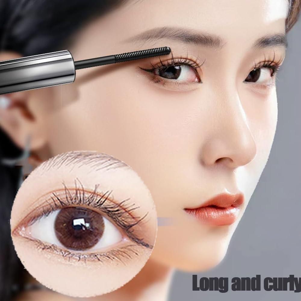 Close-up of eye showcasing long, curly lashes enhanced by premium iron brush mascara.