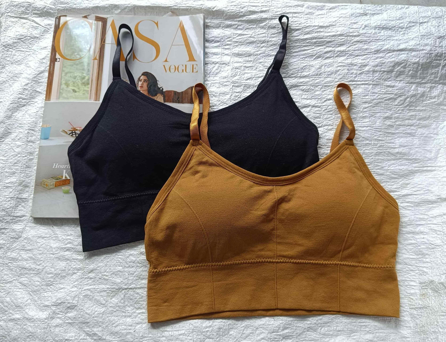 Seamless padded bra pack featuring black and mustard bras for comfortable everyday wear