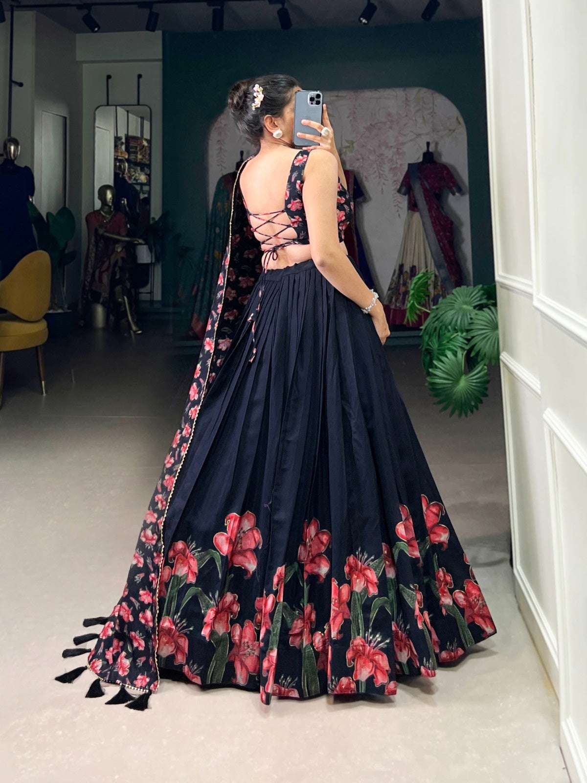 Elegant black luxury lehenga choli with floral embroidery and stylish back design for festive occasions