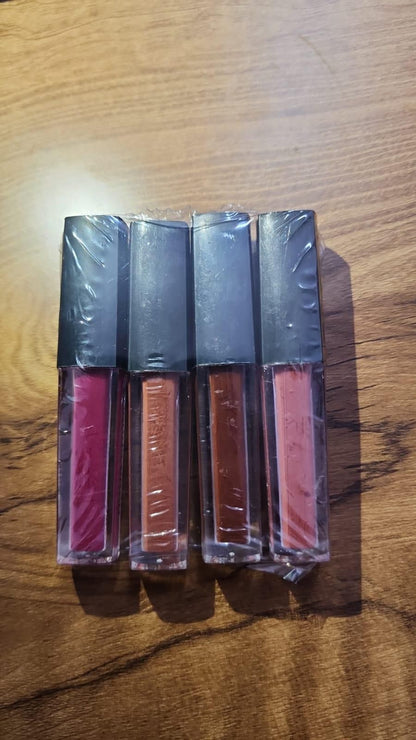 Luxury liquid lipstick set featuring four vibrant shades in a sleek packaging for a glamorous look