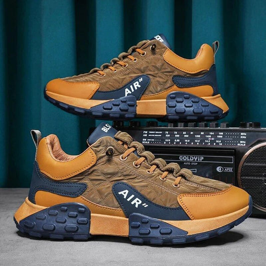Men's casual sneakers in brown and navy with breathable design and cushioned sole for comfort