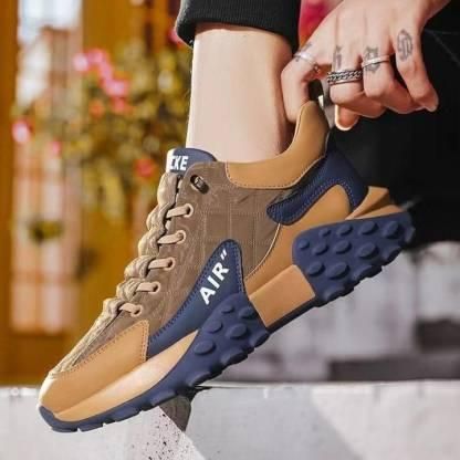 Stylish men's casual sneakers in brown and navy with durable rubber sole for everyday wear