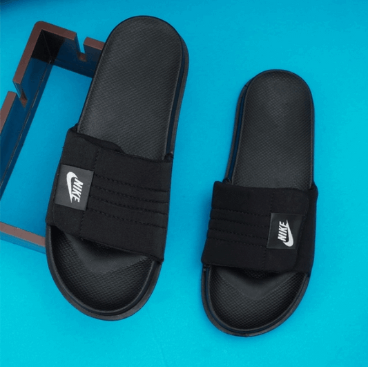 Black sliders for men by Nike with a comfortable strap design and textured footbed