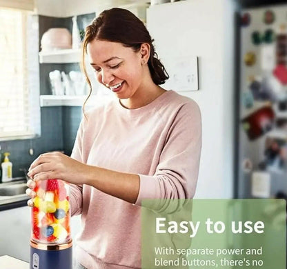 Woman using a portable juicer for travel with colorful fruit for easy blending in the kitchen