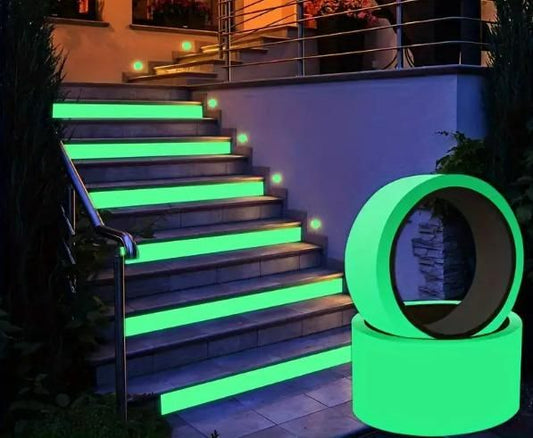 Self-adhesive safety tape glowing on outdoor stairs for enhanced visibility at night