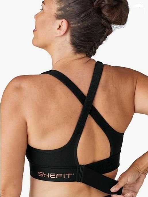 Back view of a black high impact sports bra women featuring adjustable straps for maximum support